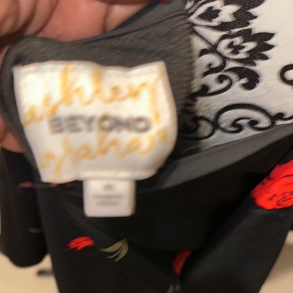 Black Sleeveless Dress with Embellished Front Design - Picture 3 of 6